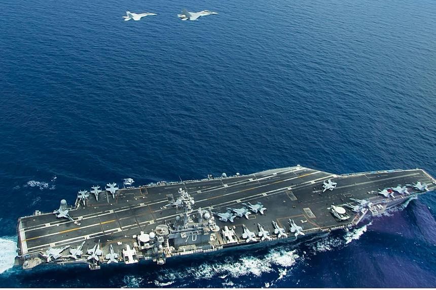 The aircraft carrier USS Carl Vinson (CVN 70) operating in the South China Sea during a bi-lateral exercise aimed at promoting interoperability with the Malaysian Royal Military, on May 10, 2015.&nbsp;China said on Monday, May 25, that it had lodged 