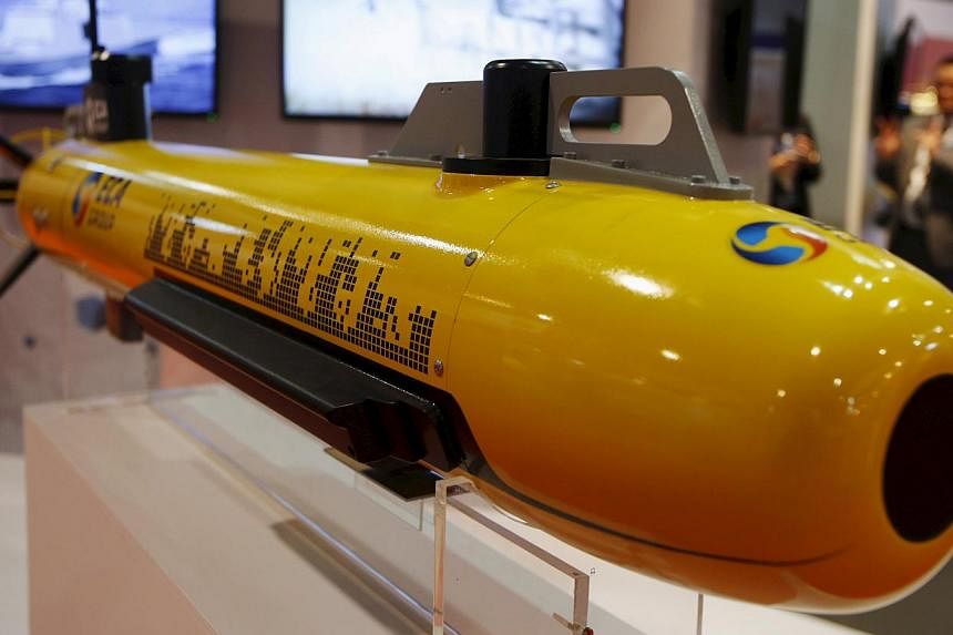 An autonomous underwater vehicle used for surveying the sea floor is displayed at the ECA Robotics booth at the IMDEX Asia maritime defence exhibition in Singapore in this May 19, 2015 file photograph. Southeast Asian nations are prioritising spendin
