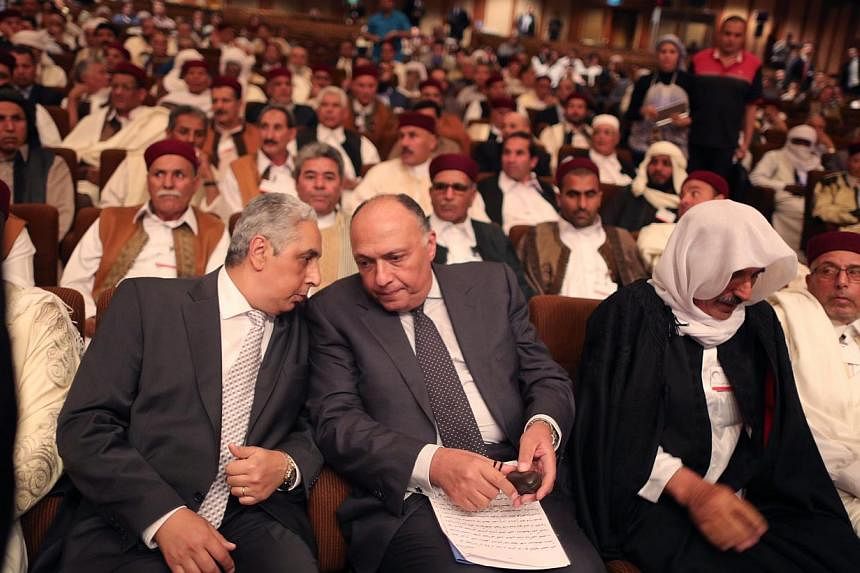 Egyptian Foreign Minister, Sameh Shukri (centre), attends a gathering of some 300 representatives from Libyan triibes in Cairo, Egypt, on May 25 2015. -- PHOTO: EPA&nbsp;