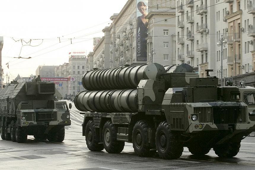 Russian S-300 anti-missile rocket system moving along a central street during a rehearsal for a military parade in Moscow in this May 4, 2009 file photo. -- PHOTO: REUTERS