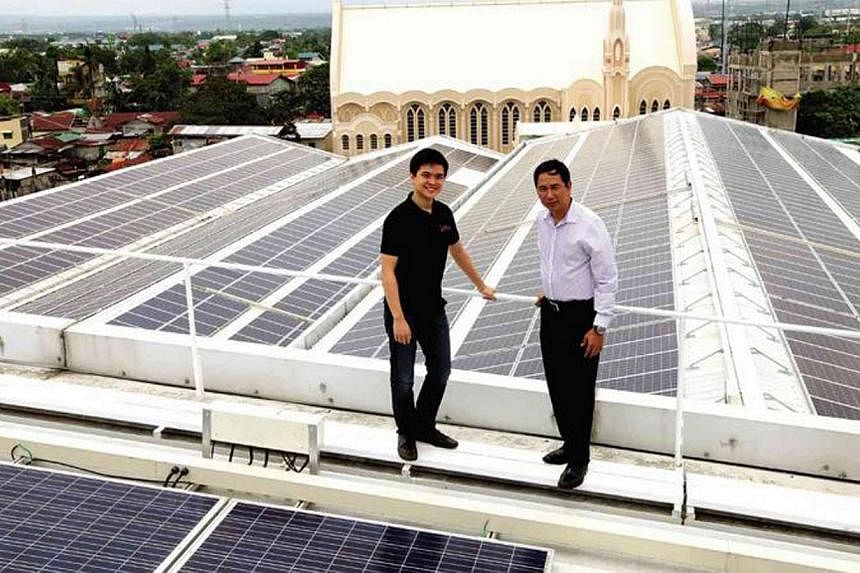 Mr Leandro Leviste (left) and former energy secretary Jericho Petilla at the inauguration of a solar farm at Central Mall in Binan.