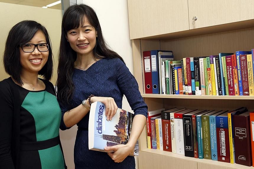 A team of experts, led by Associate Professor Joyce Lee (right) and graduate student Ms Melanie Siaw, has found that fasting during Ramadan can help to improve blood sugar levels for those with type 2 diabetes. -- ST PHOTO: CHEW SENG KIM