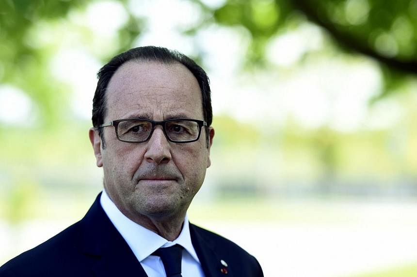French President Francois Hollande is pictured during a press conference, on the second day of the fourth European Union (EU) eastern Partnership Summit in Riga, on May 22, 2015. New questions surfaced about his personal security on Tuesday as Le Mon