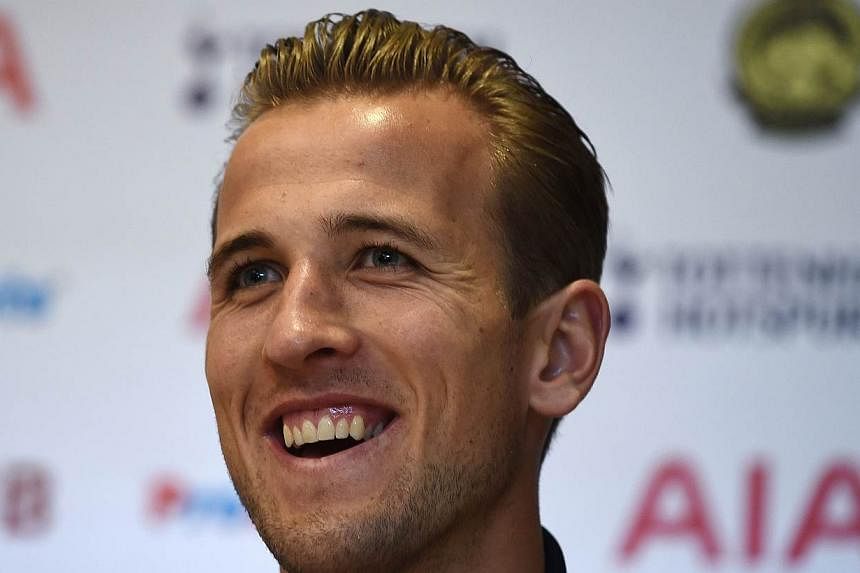 Tottenham striker Harry Kane on Tuesday dismissed speculation of a move to Manchester United following his breakout season, as Spurs readied for a friendly in Kuala Lumpur against a Malaysian select squad. -- PHOTO: AFP