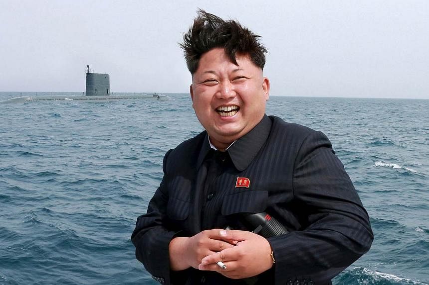 North Korean leader Kim Jong Un watches the test-fire of a strategic submarine underwater ballistic missile (not pictured), in this undated photo released by North Korea's Korean Central News Agency (KCNA) in Pyongyang on May 9, 2015. Kim has hailed 