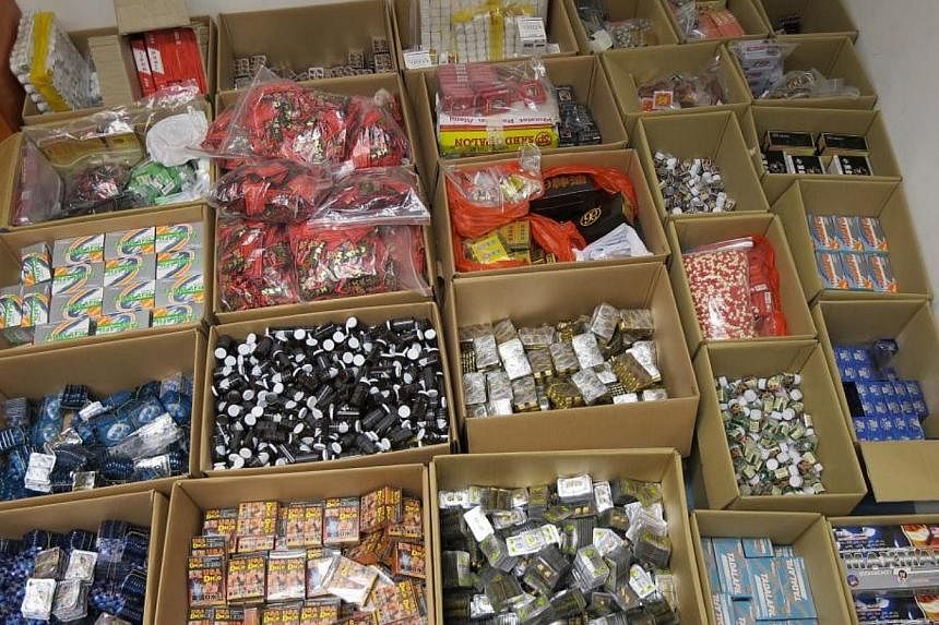 The haul included more than 94,000 units of what were mainly sexual enhancement drugs, with a total of 80 different types of products. -- PHOTO: HSA/ICA