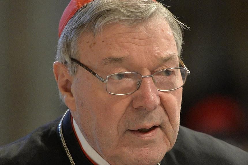 This file photograph taken on April 2, 2015 shows Australian Cardinal George Pell, Prefect of the Secretariat for the Economy of the Holy See arriving to attend mass for Holy Thursday which marks the start of Easter celebrations at St Peter's basilic
