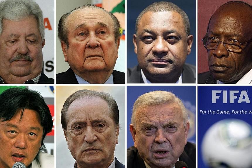 A combination of file pictures made on May 27, 2015 shows Fifa officials (left to right, from upper row) Rafael Esquivel, Nicolas Leoz, Jeffrey Webb, Jack Warner, Eduardo Li, Eugenio Figueredo and Jose Maria Marin. The seven men were arrested on Frid