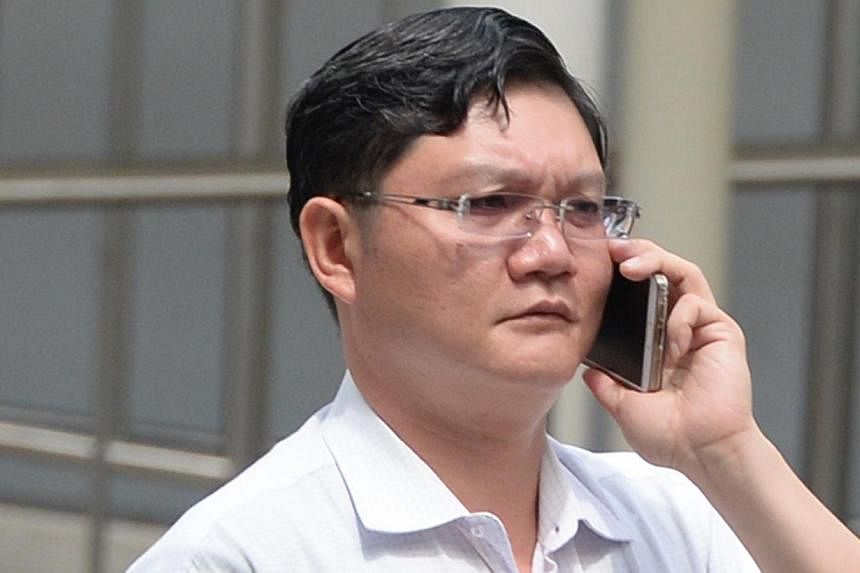 Low Teow Guan was jailed for 12 weeks on Wednesday in relation to a long-running online vice ring scandal involving an underage girl. -- ST PHOTO:&nbsp;AZIZ HUSSIN
