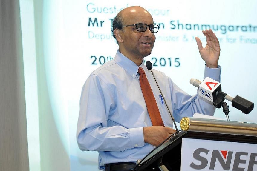 Deputy Prime Minister Tharman Shanmugaratnam making a speech during a gathering of 50 MNCs and SMEs on May 20, 2015, to pledge their support for the SkillsFuture scheme. -- ST PHOTO: TIFFANY GOH