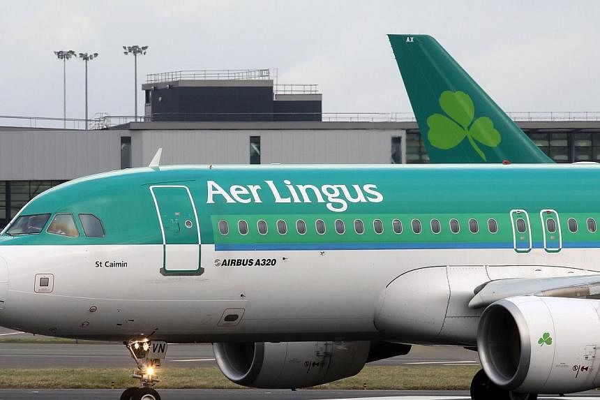 An Aer Lingus flight taxis at Dublin Airport in Ireland in January. -- PHOTO: AFP&nbsp;