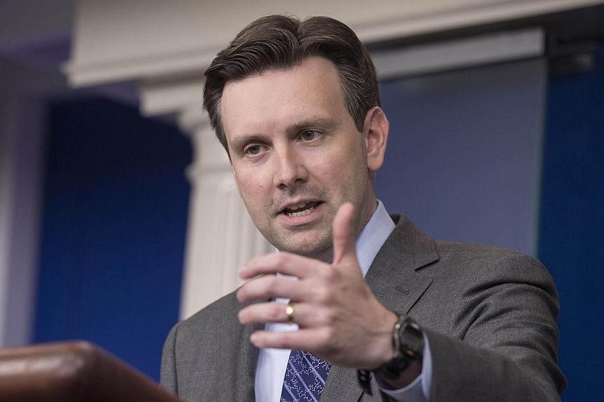 US Press Secretary Josh Earnest speaks during the daily briefing at the White House in Washington, DC, earlier this month. -- PHOTO: AFP&nbsp;