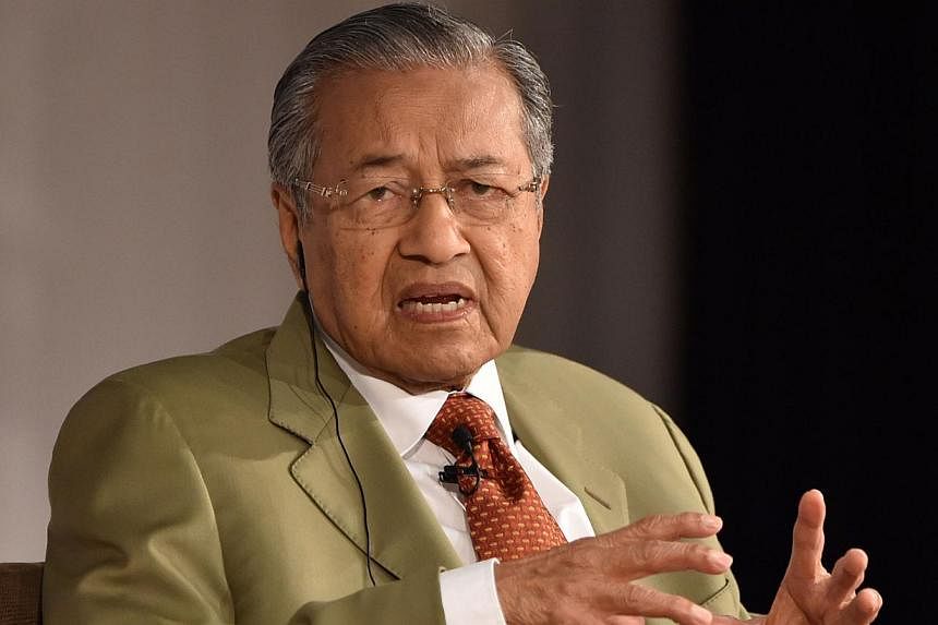 Former prime minister Dr Mahathir Mohamad has questioned whether 1Malaysia Development Berhad (1MDB) was involved in money laundering. -- PHOTO: AFP