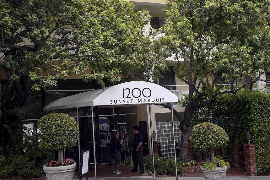 Media gathering outside the Sunset Marquis hotel where U2 tour manager Dennis Sheehan was pronounced dead in his hotel room, according to local media, in West Hollywood, California on May 27, 2015. -- PHOTO: REUTERS&nbsp;