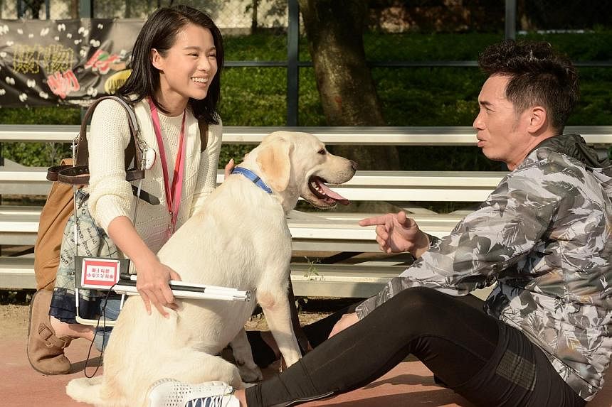 Hong Kong actress Myolie Wu plays a blind woman with a guide dog in Every Step You Take with co-star Moses Chan. -- PHOTO: TVB