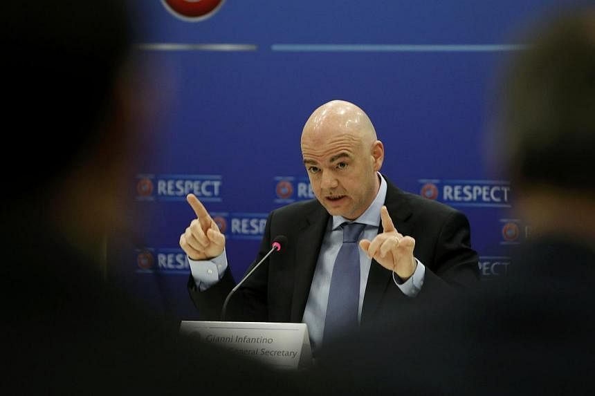 Uefa General Secretary Gianni Infantino addressing a news conference after a Uefa Executive Committee meeting on March 23, 2015. The Fifa presidential election should be postponed after football's world governing body became embroiled in two corrupti