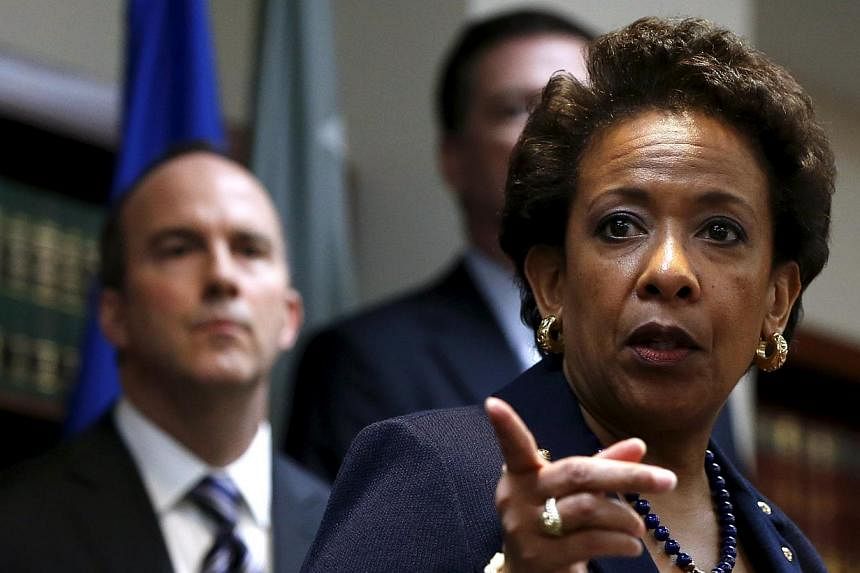 US Attorney General Loretta Lynch points during a news conference at the U.S. Attorney's Office of the Eastern District of New York in the Brooklyn borough of New York on May 27, 2015. -- PHOTO: REUTERS