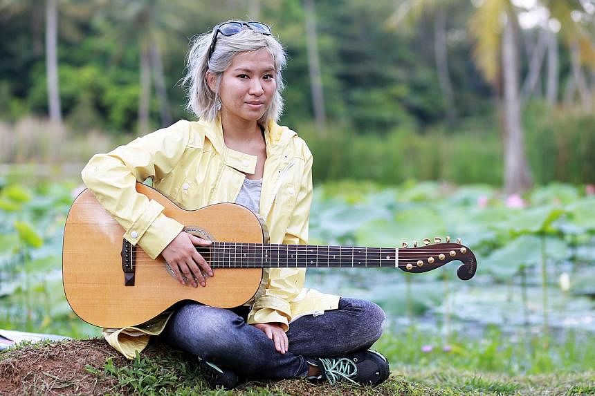 Singer- songwriter Inch Chua has been staying at a kampung on Pulau Ubin to find inspiration for her new songs. -- ST PHOTO: DANIEL NEO