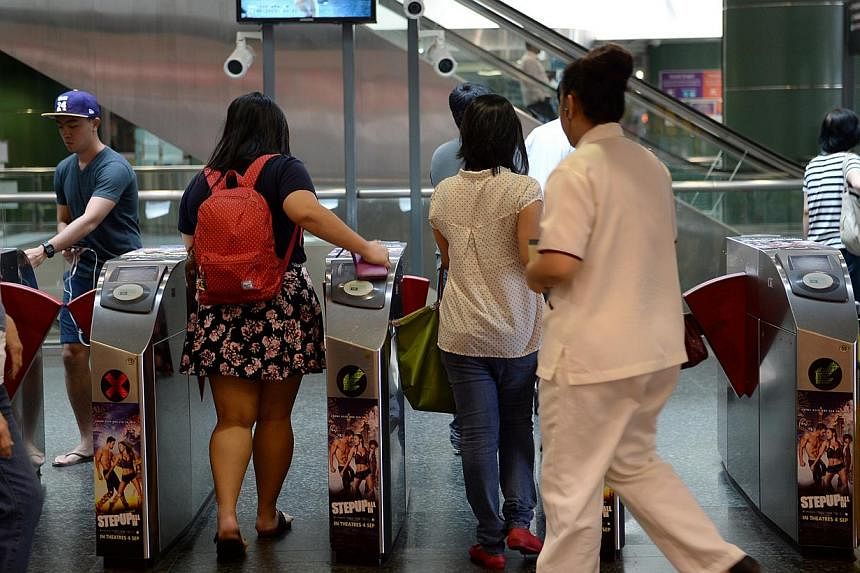 Off-peak passes for public transport will be available to the public from June 28 for $80 a month. -- ST PHOTO: JOYCE FANG