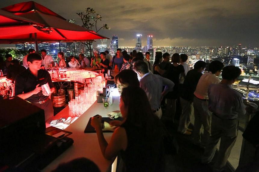 One of the biggest nightclub draws here, the 57th-floor bar on top of MBS has two weeks to undertake to the Court of Appeal that it will stop using the name. If not, the court will issue an order to stop its use. -- PHOTO: ST FILE