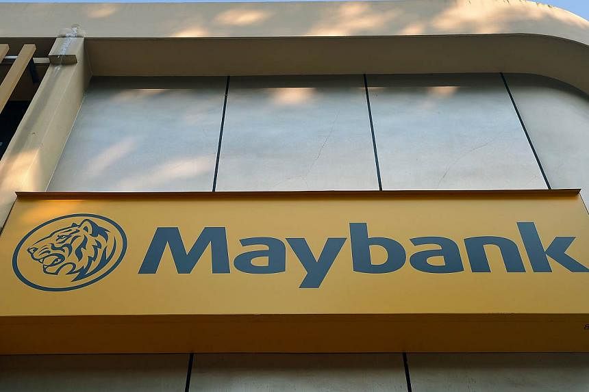 Maybank posted a better than expected 6.3 per cent rise in quarterly profit, but gave a cautious outlook due to the launch of a new consumer tax in Malaysia in April. -- ST FILE PHOTO