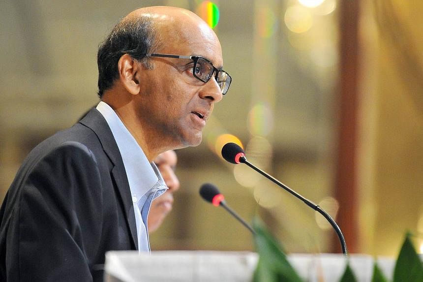 Deputy Prime Minister and Minister for Finance Tharman Shanmugaratnam has been re-appointed by the Monetary Authority of Singapore as chairman of the board of directors for another three-year term. -- PHOTO: ST FILE