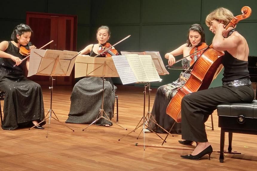 (From left) Violinist Yuki Kasai, violinist Tang Tee Khoon, violist Mariko Hara and cellist Olivia Jeremias. -- PHOTO: CHANG TOU LIANG&nbsp;