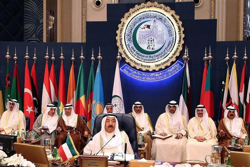 Emir of Kuwait Sheikh Sabah al-Ahmad al-Jaber al-Sabah (centre) chairs the opening of the 42nd Session of the Council of Foreign Ministers (CFM) of the Organization of Islamic Corporation (OIC) with the theme "Joint Vision to Strengthen Tolerance and