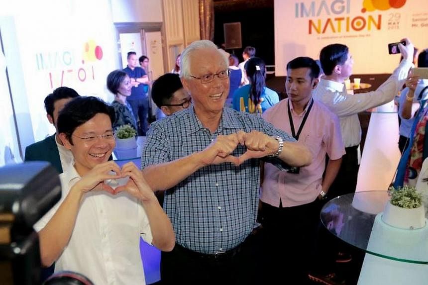 Emeritus Senior Minister Goh Chok Tong (centre) and Minister Lawrence Wong at&nbsp;the launch of ImagiNation - an exhibition at *Scape created in celebration of Kindness Day SG on May 29, 2015. -- PHOTO: SINGAPORE KINDNESS MOVEMENT