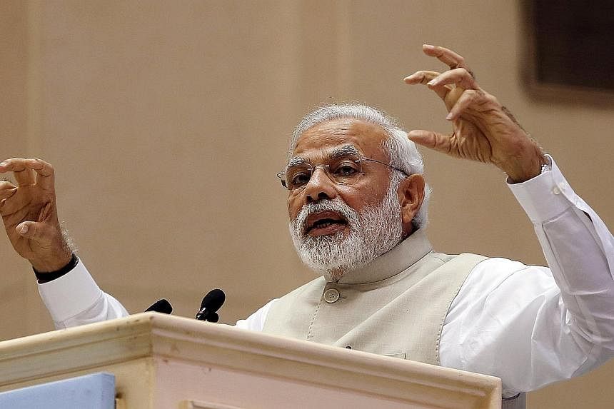 India's Prime Minister Narendra Modi speaks at the inaugural session of RE-Invest 2015, the first Renewable Energy Global Investors Meet &amp; Expo, in New Delhi, India, in this February 15, 2015 file photo. India on May 29 reported economic growth o