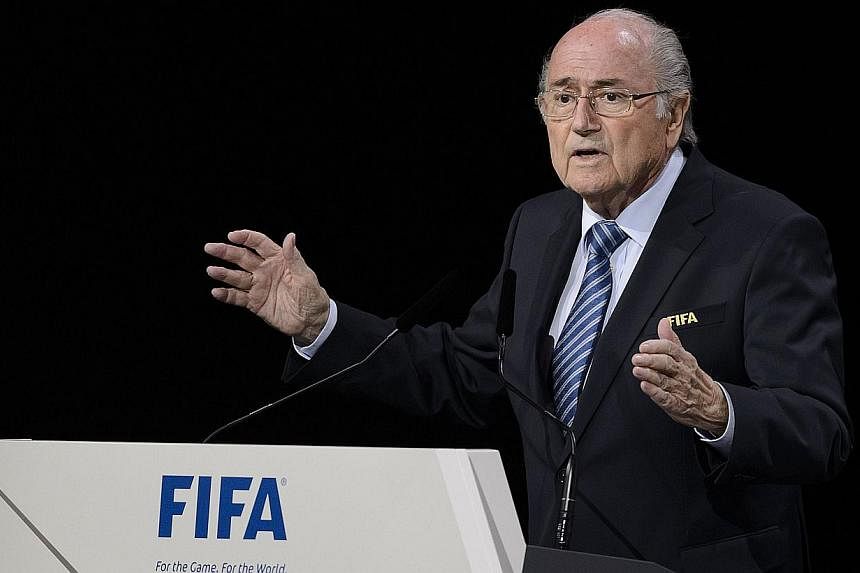 FIFA president Sepp Blatter delivers his speech ahead of the vote to decide on the FIFA presidency in Zurich on May 29, 2015. -- PHOTO: AFP&nbsp;