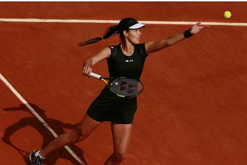 Former champion Ana Ivanovic reached the French Open last 16 in just 53 minutes on Friday while Alize Cornet kept home hopes alive by making the second week for the first time. -- PHOTO: REUTERS&nbsp;