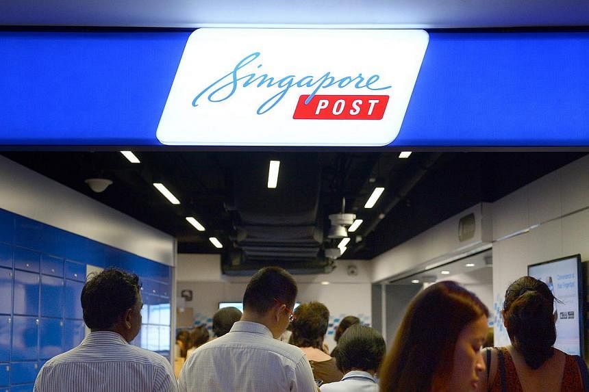 Singapore Post Limited has announced that the company will enhance its dividend policy from financial year ending March 31, 2016, aiming to make a total annual dividend payout of 7 cents per share to be paid on a quarterly basis. -- PHOTO: ST FILE