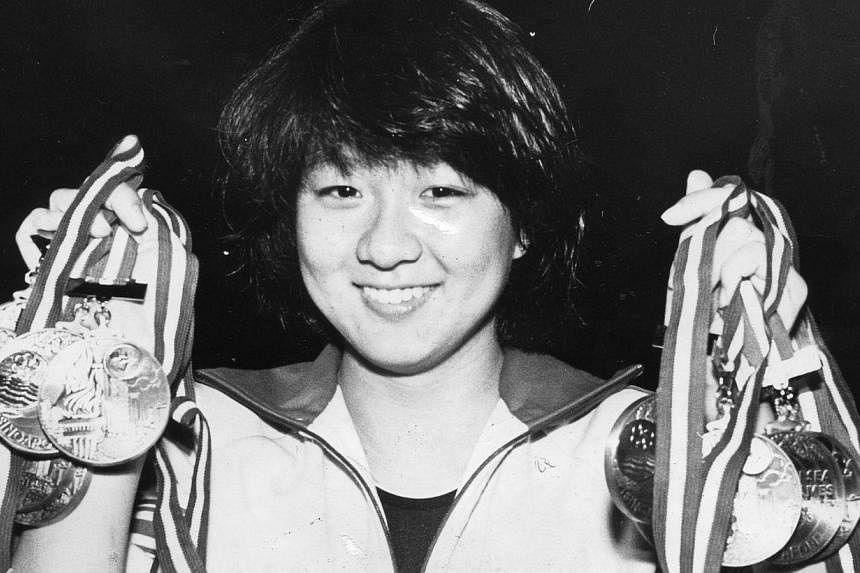 Swimmer Junie Sng retired aged only 19. She won 10 golds in 10 days. The opening ceremony of the 12th SEA Games at the National Stadium on May 28, 1983 was so wet it made it look like the 'Umbrella Games' instead.