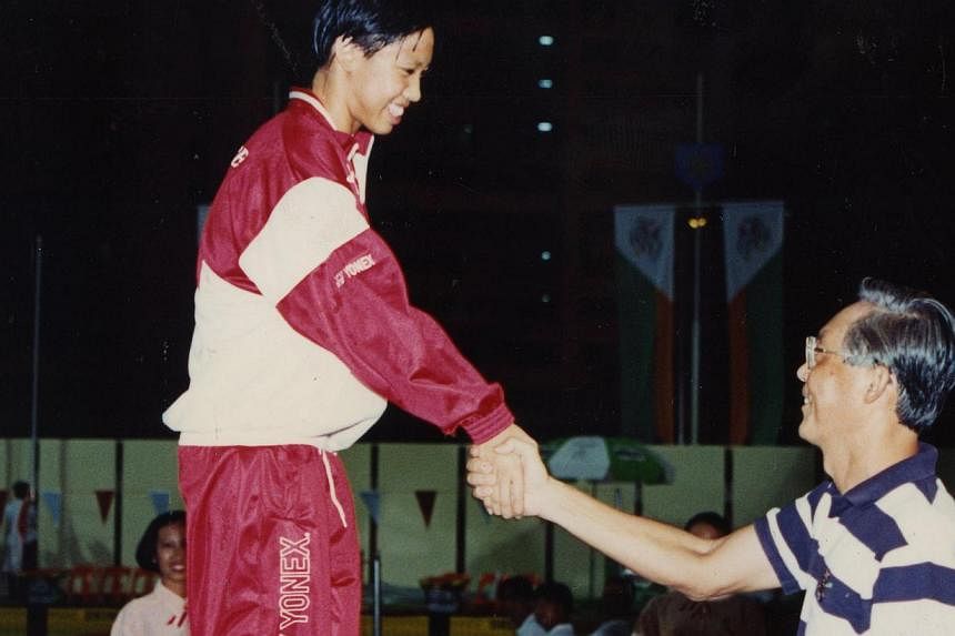 Joscelin Yeo being congratulated by then-Prime Minister Goh Chok Tong after winning the 100m freestyle, the first of her nine gold medals in the 1993 SEA Games. Singapore won 50 gold medals at the Games.