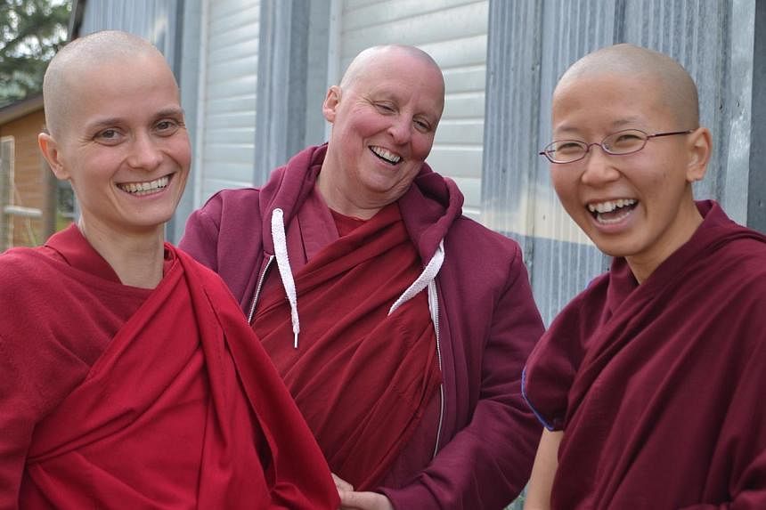 Thubten Damcho (far right), with her dharma sisters, after being ordained at Sravasti Abbey. -- PHOTO: COURTESY OF THUBTEN DAMCHO