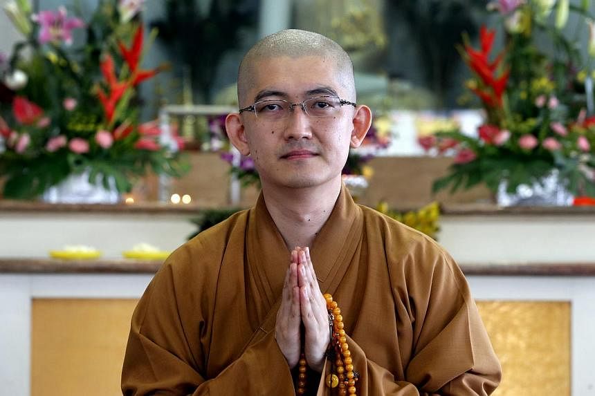 Venerable Shi You Guang is now a spiritual adviser at Puat Jit Buddhist Temple in Sengkang, where he conducts Buddhist classes and gives talks. -- ST PHOTO: CHEW SENG KIM