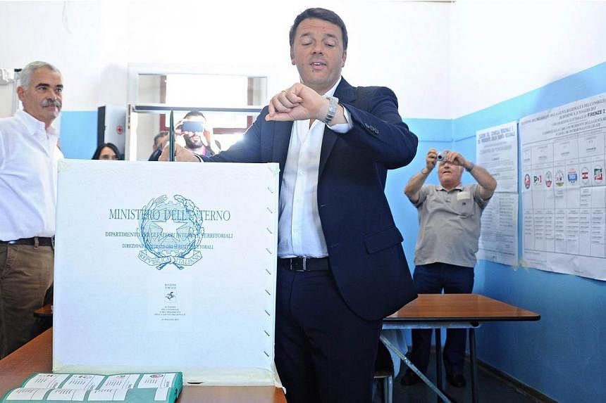 Italian Premier Matteo Renzi casts his ballot at a polling station in Pontassieve, near Florence, Italy, on May 31, 2015.&nbsp;Mr Renzi was left licking his wounds on Monday, June 1, after suffering a setback in regional elections which saw both the 
