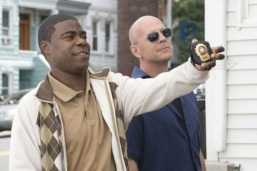 Tracy Morgan (left) performs in a scene from the movie Cop Out. The entertainer, speaking on television for the first time since being injured in a crash a year ago with a Wal-Mart truck, vowed on Monday to return to comedy but says he needed more ti