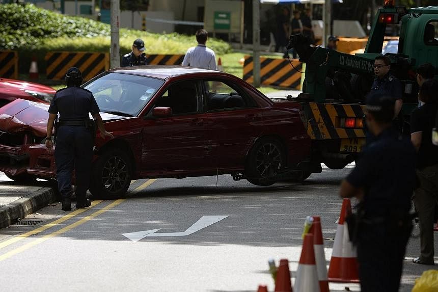 The red sedan car with a bullet hole on the front windscreen which was involved in an early morning shooting incident&nbsp;on May 31, 2015. A man identified as Mohamad Taufik Zahar was shot dead and two others, Mohamed Ismail and Muhammad Syahid Moha