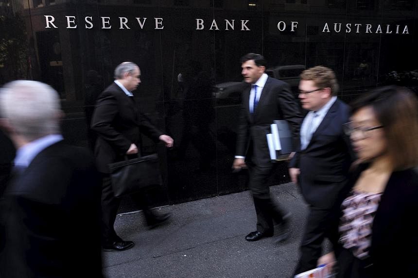 Australia's central bank left interest rates steady on Tuesday a month after cutting them to all-time lows, saying policy needed to be stimulative given sub-standard economic growth, a high currency and tame inflation. -- PHOTO: REUTERS