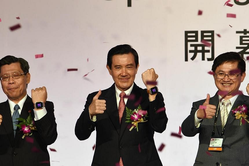Taiwanese President Ma Ying-jeou (centre) with local officials during the opening of the Computex trade show in Taipei on June 2, 2015. Mr Ma warned on Tuesday of damage to Taiwan's economy if the legislature does not pass controversial trade deals w