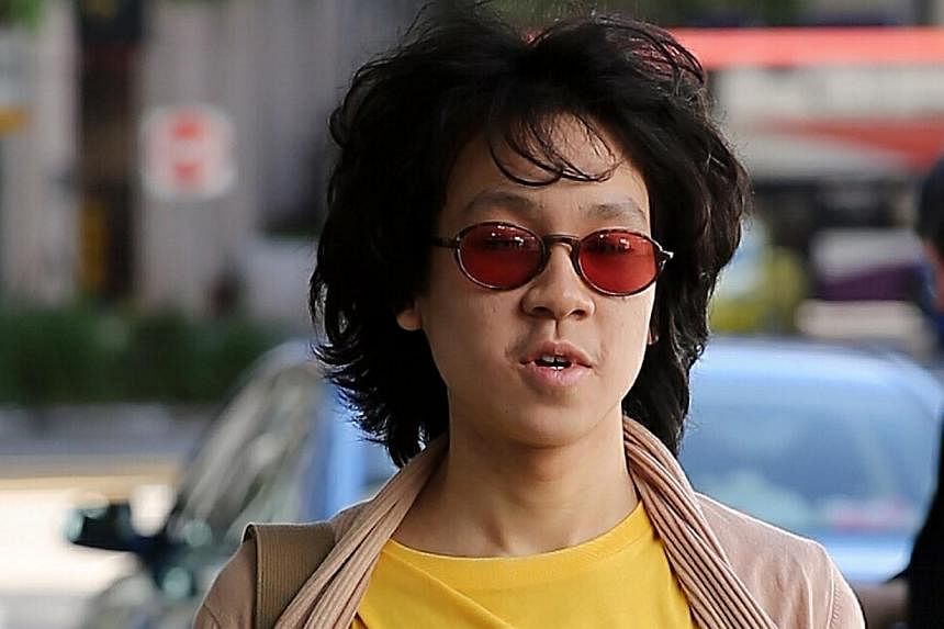 Amos Yee arriving at the State Courts on June 2, 2015. Yee is back in prison for three weeks, after the judge who heard his case on Tuesday morning called for a reformative training report. -- ST PHOTO: WONG KWAI CHOW