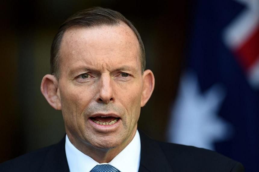 Australian Prime Minister Tony Abbott has reprimanded his ministers after proposals made during Cabinet discussions were leaked to the media before he announced it. -- PHOTO: EPA&nbsp;