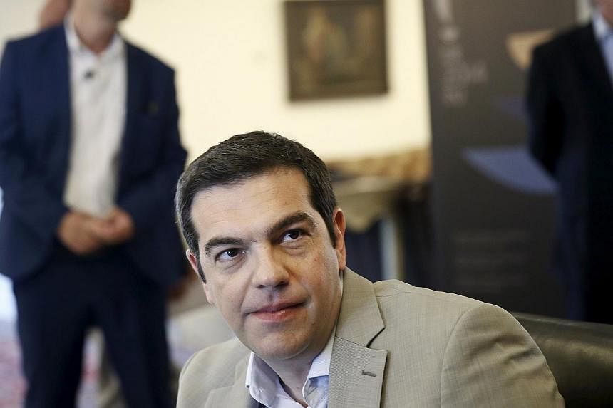 Greek Prime Minister Alexis Tsipras looks on during a meeting at the Ministry of Culture, Education and Religious Affairs in Athens June 2, 2015. -- PHOTO: REUTERS &nbsp;