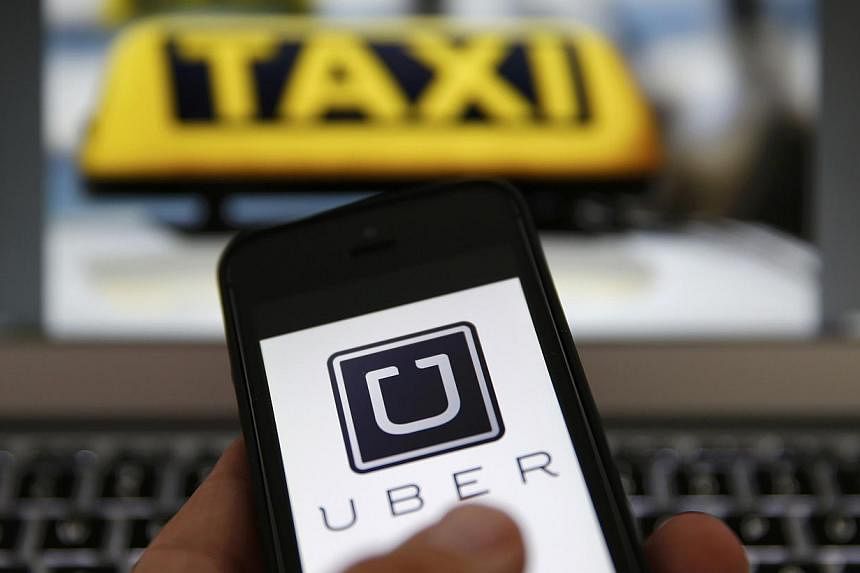 An Indian woman has accused a driver contracted with online taxi company Uber of trying to sexually harass her after she hailed his cab on Saturday on May 30, 2015. -- PHOTO: REUTERS