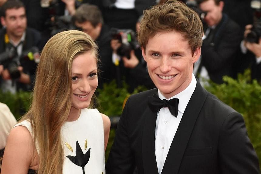 Hannah Bagshawe (left) and Eddie Redmayne arrive at the Costume Institute Gala Benefit at The Metropolitan Museum of Art on May 5, 2015 in New York. The Oscar-winning actor will enter the world of magic in Warner Bros' anticipated Harry Potter spin-o