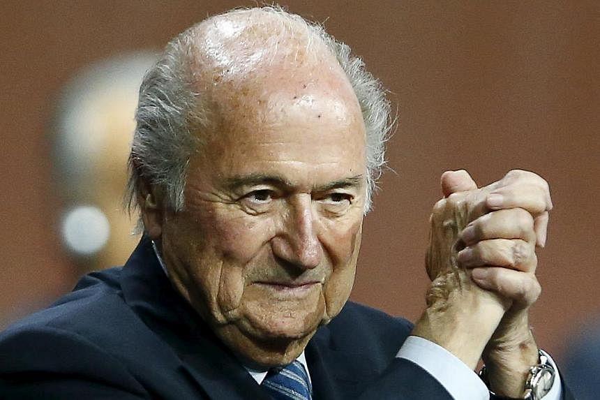 Fifa president Sepp Blatter gesturing after he was re-elected for a fifth term at the 65th Fifa Congress in Zurich, Switzerland, on May 29, 2015. -- PHOTO: REUTERS