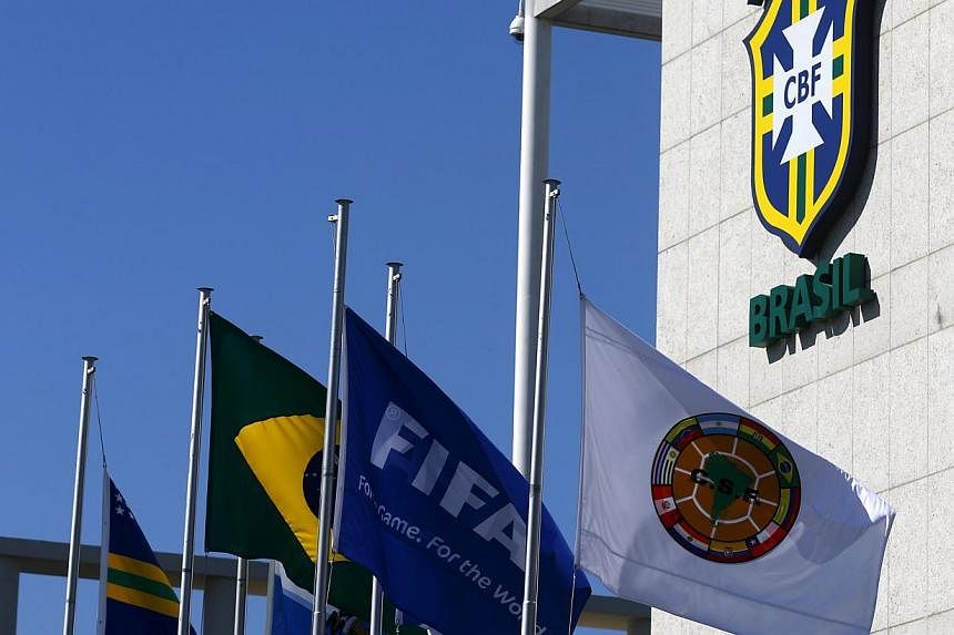 A Fifa flag flying outside the Brazilian Football Confederation headquarters in Rio de Janeiro last week. The confederation removed the name of Jose Maria Marin from the facade of its headquarters one day after its former president was arrested in a 