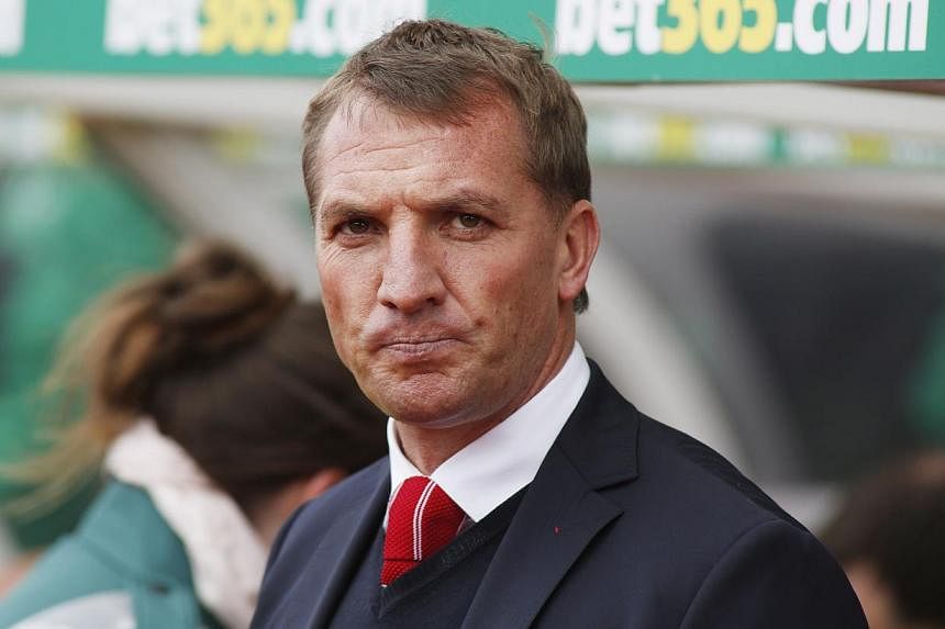 Brendan Rodgers will be given another chance to deliver Liverpool their first league title in over a quarter of a century after he held talks with the club's American owners on Tuesday both the Press Association and the BBC reported. -- PHOTO: REUTER